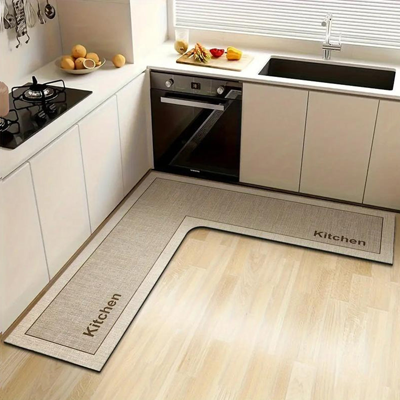 ๐2026 Sale Over 17,000 Sold! ๐ฅ49% OFF! ๐ง๐ง Stop slipping on wet kitchen floors โ this L-shaped mat absorbs water and oil fast, stays put, and cushions your feet while you cook. ๐