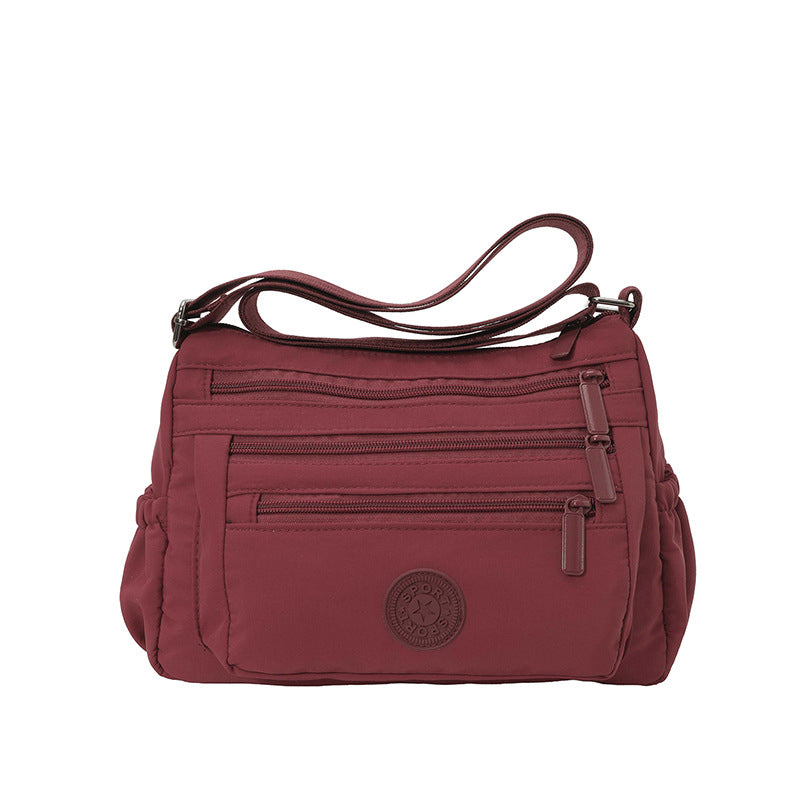 🔥HOT SALE👜✨Lightweight Nylon Multi-Pocket Crossbody Bag