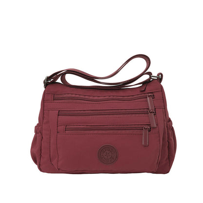 🔥HOT SALE👜✨Lightweight Nylon Multi-Pocket Crossbody Bag