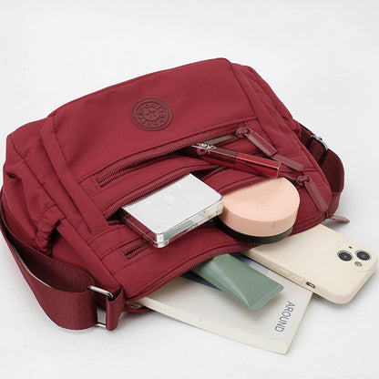 🔥HOT SALE👜✨Lightweight Nylon Multi-Pocket Crossbody Bag