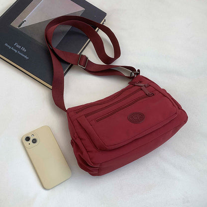 🔥HOT SALE👜✨Lightweight Nylon Multi-Pocket Crossbody Bag