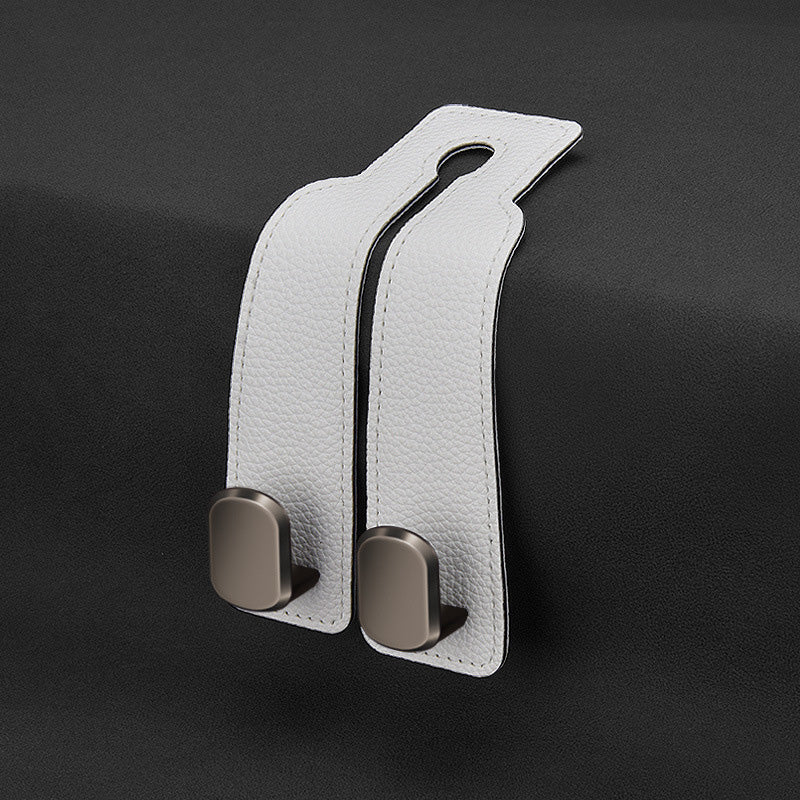 🏆Limited-time Offer🚗Premium Faux Leather Headrest Hooks – Smart, Stylish & Tool-Free Car Storage for Bags, Coats & More✨