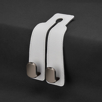 🏆Limited-time Offer🚗Premium Faux Leather Headrest Hooks – Smart, Stylish & Tool-Free Car Storage for Bags, Coats & More✨