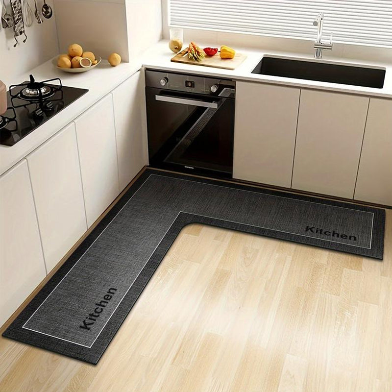 🎉2026 Sale Over 17,000 Sold! 🔥49% OFF! 🧊💧 Stop slipping on wet kitchen floors — this L-shaped mat absorbs water and oil fast, stays put, and cushions your feet while you cook. 🏠